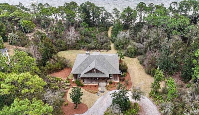 Beckoning on Perdido Bay 3 bedroom with huge Private beach by Prickett Properties