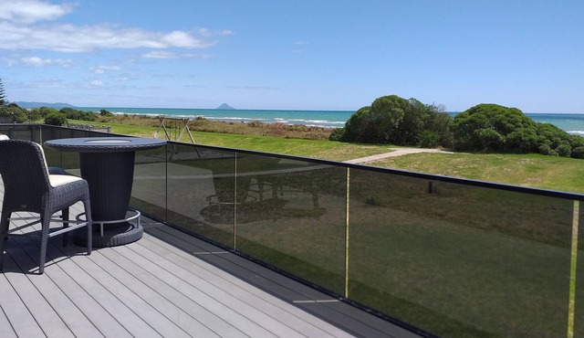 Big Black Beachfront Bach in family friendly community.
