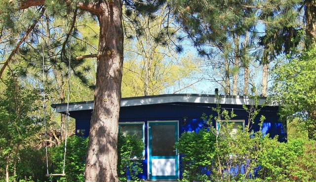 Blue Bungalow by the Lake with Boat, Private Terrace and Wi-Fi