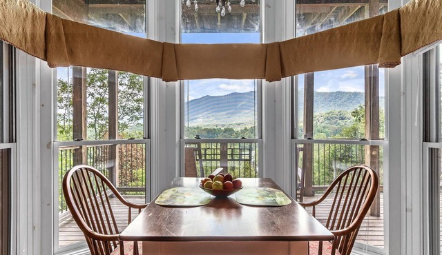 Bordeaux Chalet Retreat - Deck and Fireplace