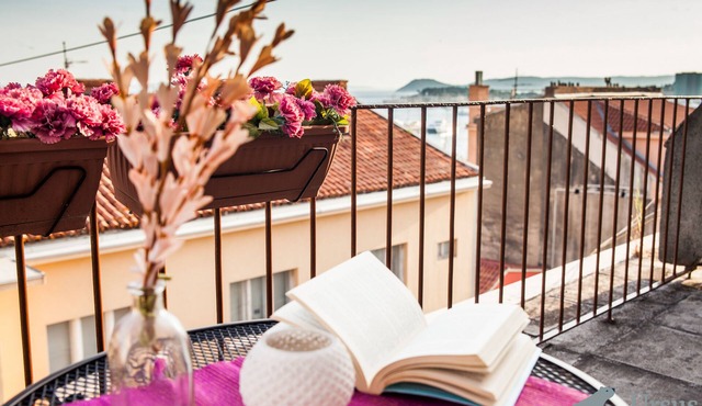 Breathtaking balcony view of the historic city center and the Adriatic sea
