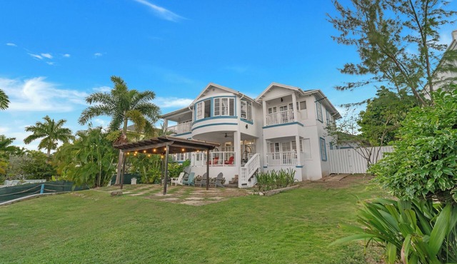 Breathtaking Villa with ocean views, hot tub, BBQ, and steps from the beach