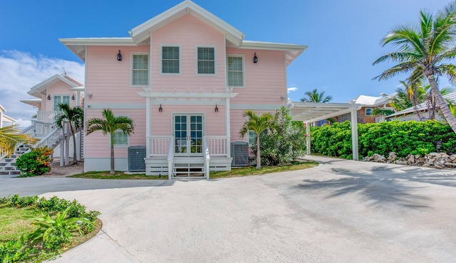 Breezy Palms: A Coastal Sanctuary with Unrivaled Elegance, Pool Dock Ocean