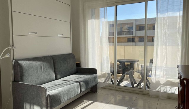 Bright 2-Room Apartment with Balcony, Secure Parking, and Modern Amenities