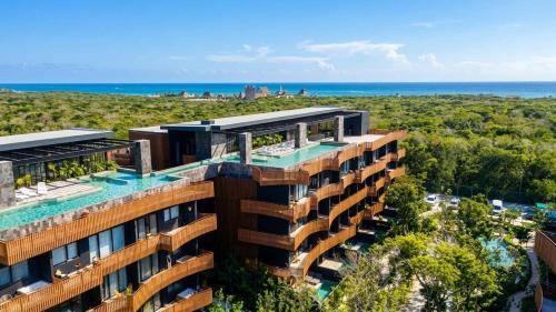Bright 2BR Amira District Gem with Shared Pool