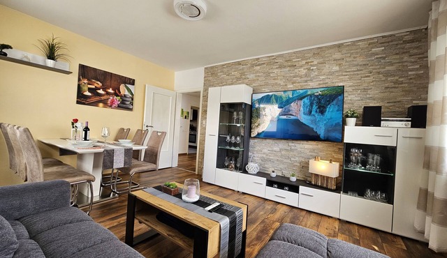 Bright and modern apartment on the ground floor in the center
