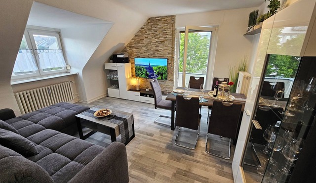 Bright and modern apartment in the attic very close to the centre and university
