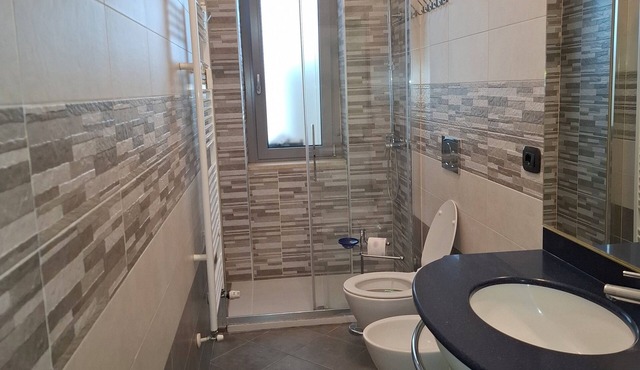 Bright and spacious apartment a stones throw from Inalpi and the Olympic Stadium