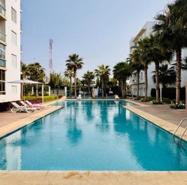 Bright Apt with Balcony, WiFi, Parking and Pool Resort