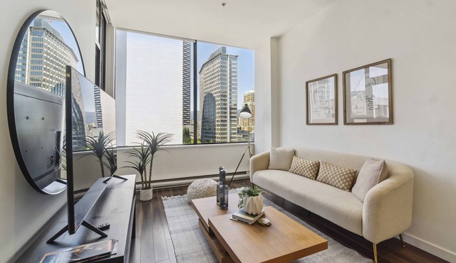 Bright Downtown 1BR, Balcony, City Views & Parking