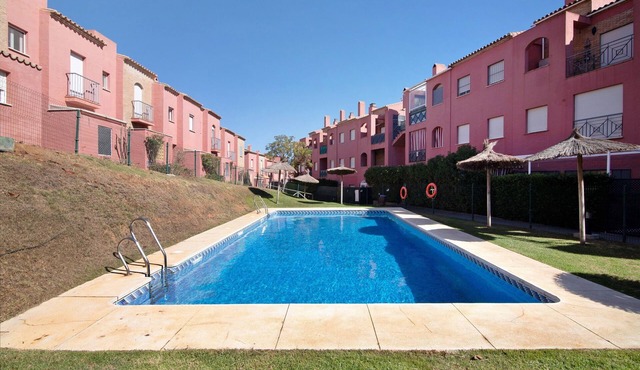 Bright Duplex on Golf Course with Shared Pool, Private Terrace, and Air Conditioning