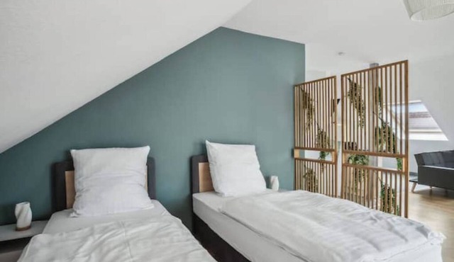 Bright feel-good apartment - quiet and close to the city center