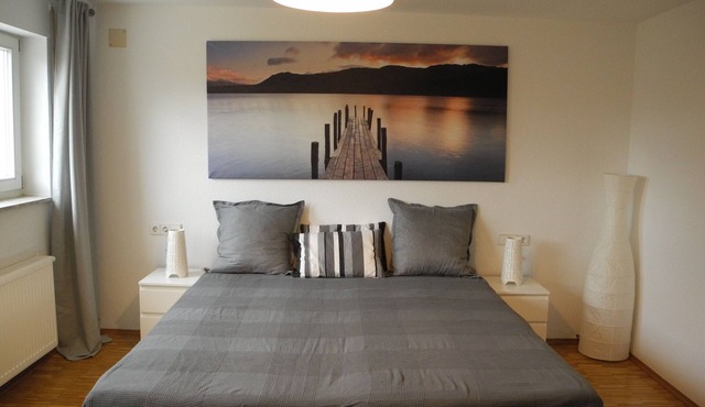 Bright modern apartment in a quiet location with its own entrance and patio