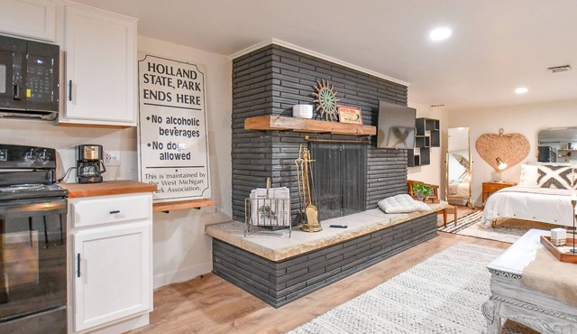 Bright & Modern Open Concept Studio I Fireplace