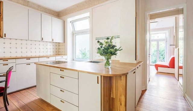 Bright, open-plan apartment in an old building