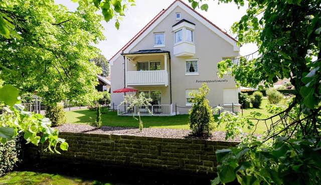 Bright, quiet and modern apartments with a great garden right in the center