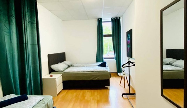 Bright & Spacious 3-BR Apt with Direct City Access