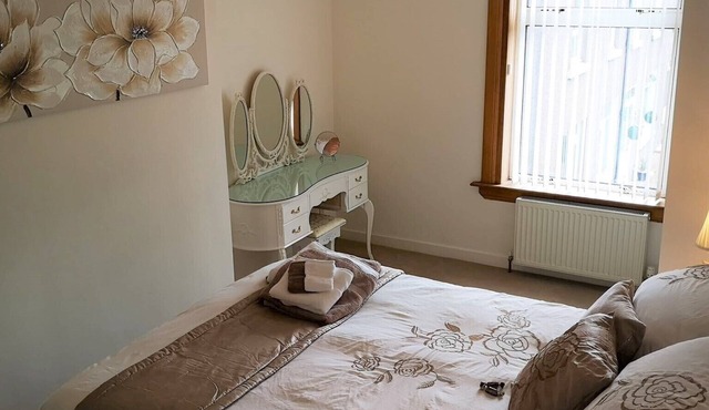 Bright, spacious centrally-located 3-bedroomed house with ample free parking.