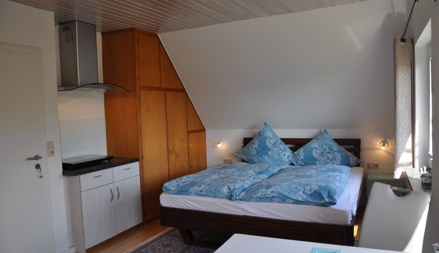 Bright studio by the lighthouse with a view of the mudflats