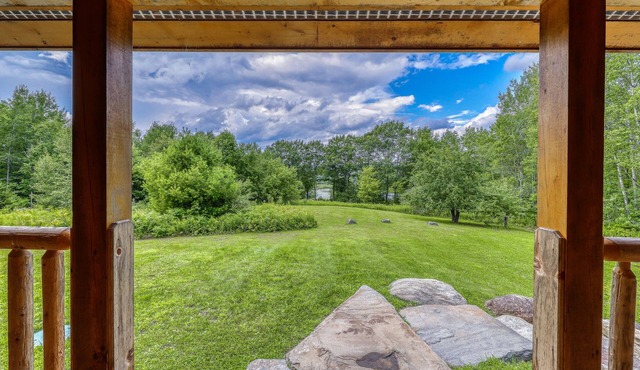 Bright three-level home with water views, jetted tub, firepit, and pool table