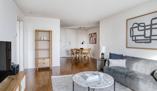 Bright UES 2BR w/Elevator, Doorman & Gym, nr Central Park, by Blueground