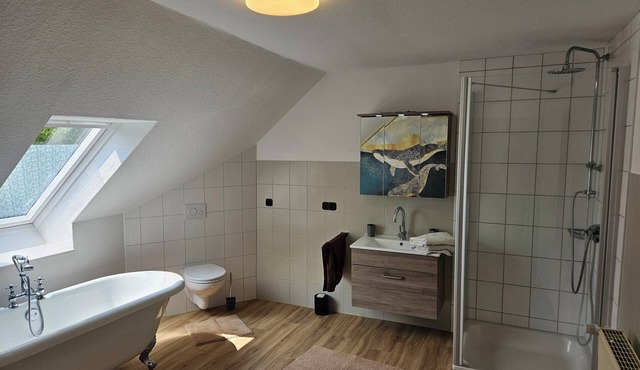 Bright vacation apartment in East Frisia with large garden and terrace