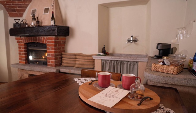 Bruno Selvago's Casba. Rustic house with exposed brick surrounded by vineyards.