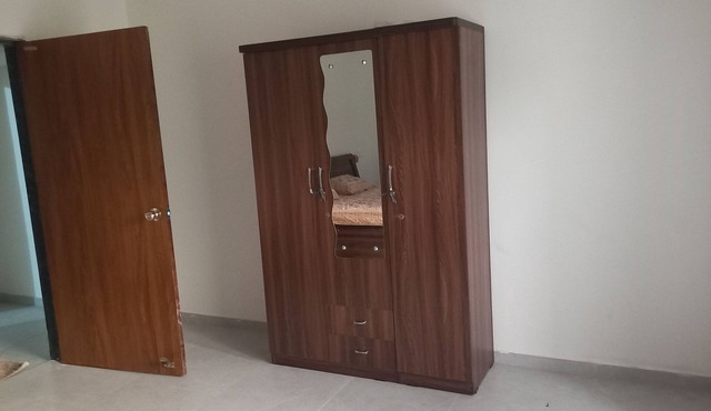 Budget friendly room in duplex bungalow for stay in Junagadh.