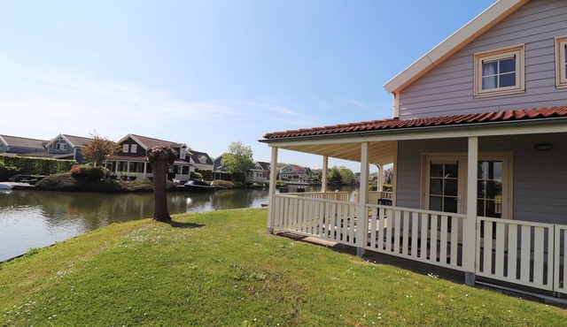Bungalow by Water near Rotterdam with Sauna