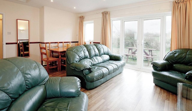 Bungalow with one double with wash basin, one double and one twin.
