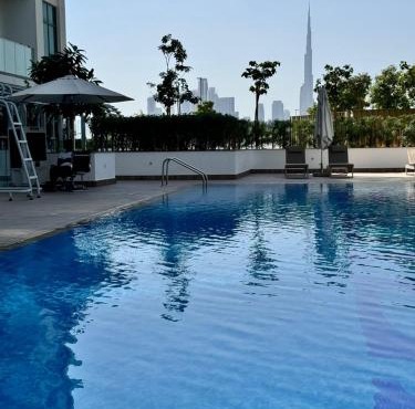 Burj Khalifa view modern 1BHK with balcony