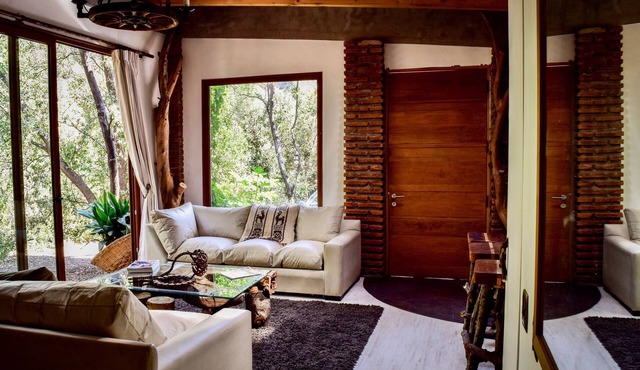 Cabin between Forest and River