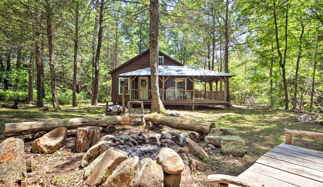 Cabin on Mountain Stream, Surrounded by Forest