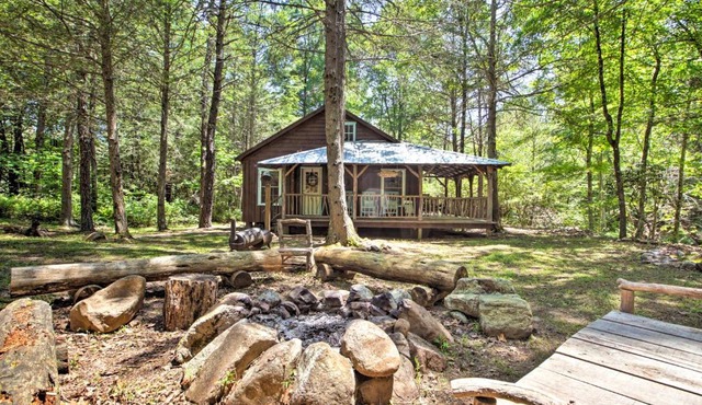 Cabin on Mountain Stream, Surrounded by Forest