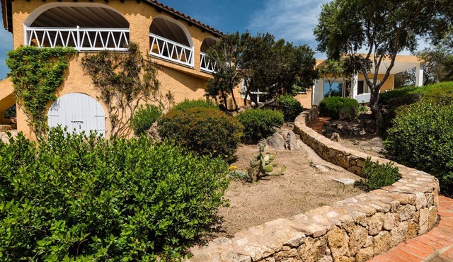 Cala Sassari – Modern Villa in front of the sea with private jetty
