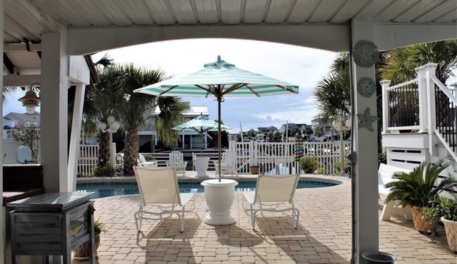 Canal-Front with Private Pool, Dock, and Spacious Comfort by Williamson Realty