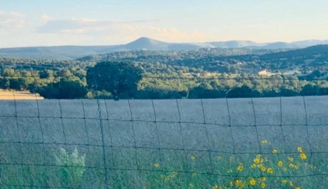 Capitan Mountain Farmsteadn5 Acre property withnMountain Views everywhere.