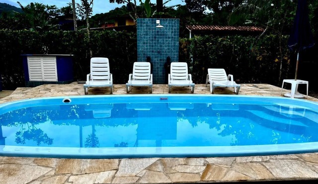 Casa Agata Bungalow with pool on the Camburi River and in the forest.