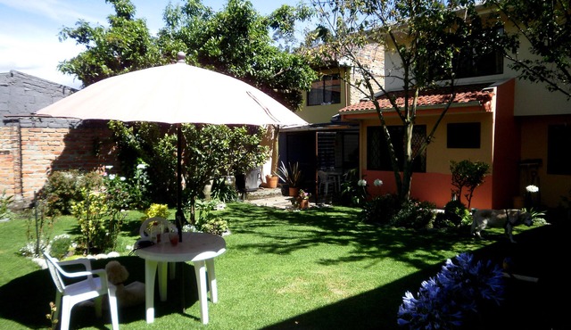 Casa Bella Mia. This Inviting, Spacious Flat With Lush Garden Awaits You!