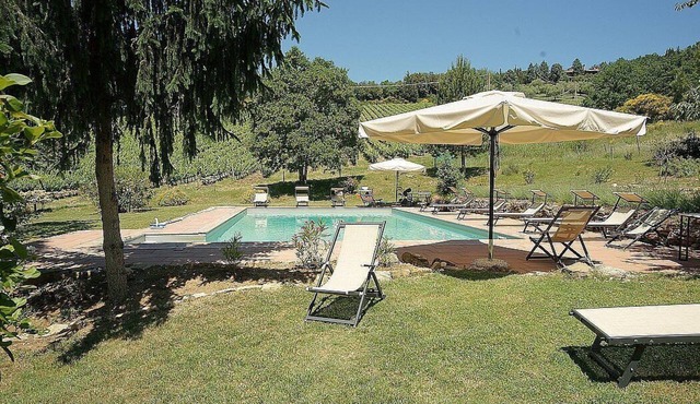 Casa Camomilla E: A characteristic and welcoming two-story independent house surrounded by meadows and by green hills, with Free WI-FI.