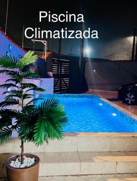 Casa com piscina climatizada em Itanhaém!