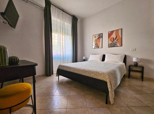 Casalú - Appartamento con Giardino Privato e Parcheggio Gratuito vicino Metro B