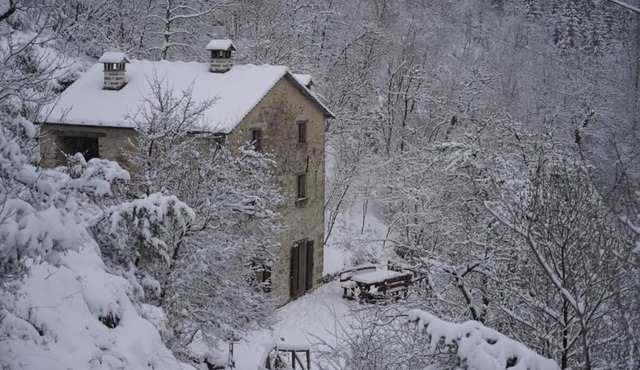 Casina del Ponte on the river in the middle of the woods