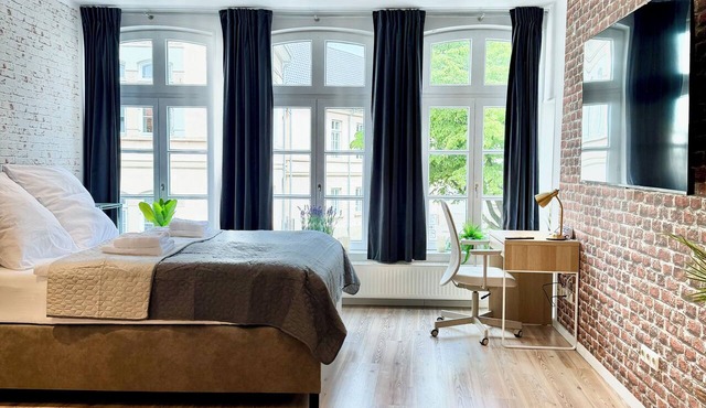 Castle Loft: Comfortable studio apartment in a historic building with a view of the castle, washing machine