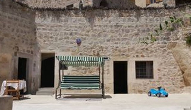 Cave accommodation in Cappadocia with stunning views over valleys and Mt. Argeus