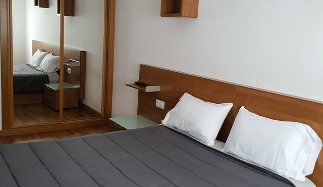 Celso Emilio Ferreiro Apartment