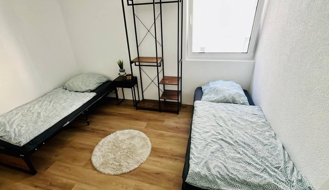 Central 1-room apartment kitchen, washing machine, parking space, flexible sleeping area