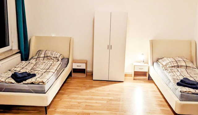 Central apartment with 3 single beds + washing machine + wifi