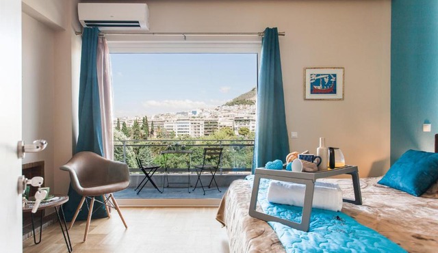 Central high-class and safe rooms next to Metro Airport Line with Acropolis View from balcony