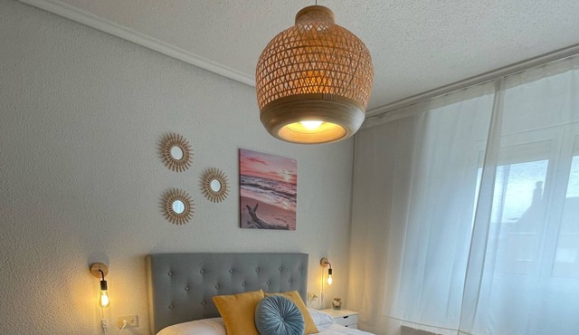Central, spacious and quiet, with a private parking space